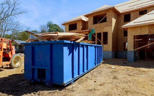 construction dumpsters can hold a wide variety of materials, including debris from demolition projects, roofing materials, lumber, and concrete